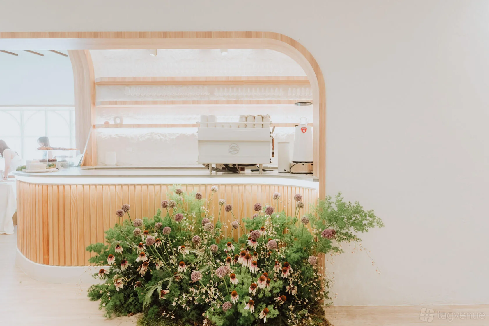 The venue's wood-slat drinks counter at HAUS217, set up for the open bar